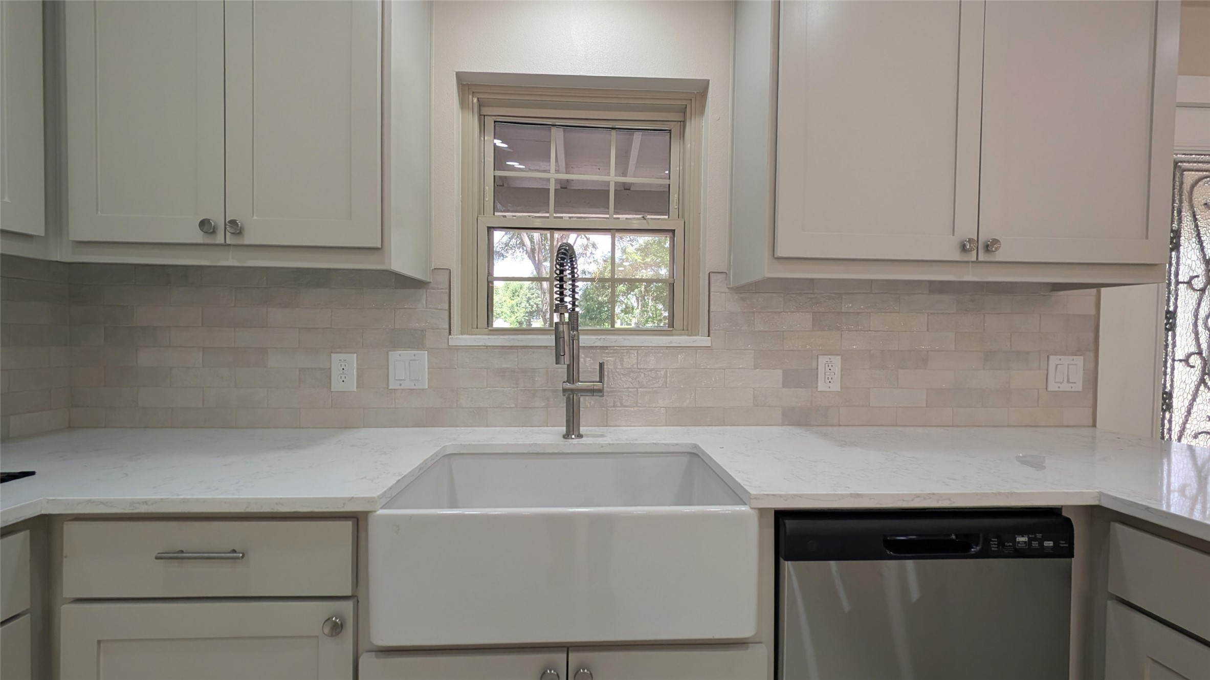 11811 Sleepy Hollow Road Manchaca, TX 78652 - Photo 11 of 31 a kitchen with a sink and cabinets