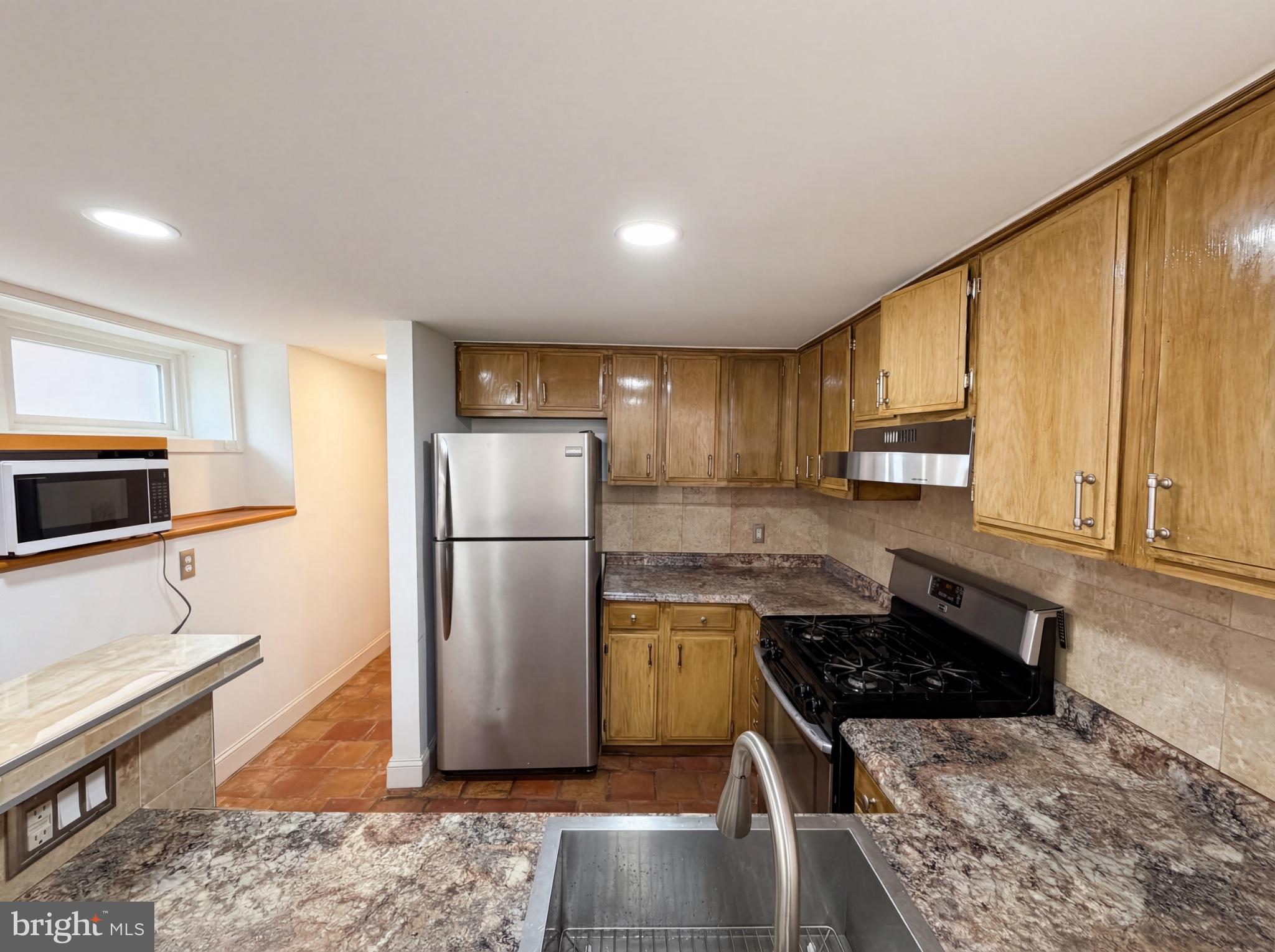 724 13th Street Northeast Washington, DC 20002 - Photo 2 of 20 Modern kitchen with sleek finishes.