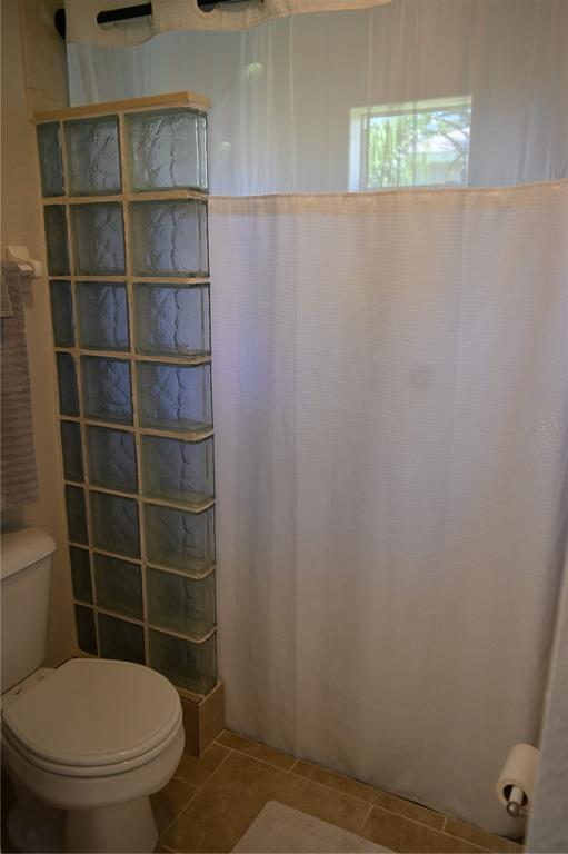 5378 Dunsmuir Road North Port, FL 34288 - Photo 16 of 59 a bathroom with a toilet and a shower