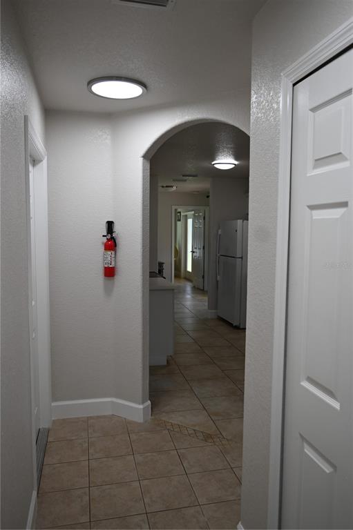 5378 Dunsmuir Road North Port, FL 34288 - Photo 23 of 59 a view of a hallway with a room