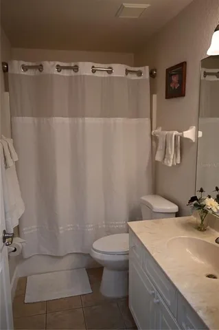 a view of a bedroom with closet