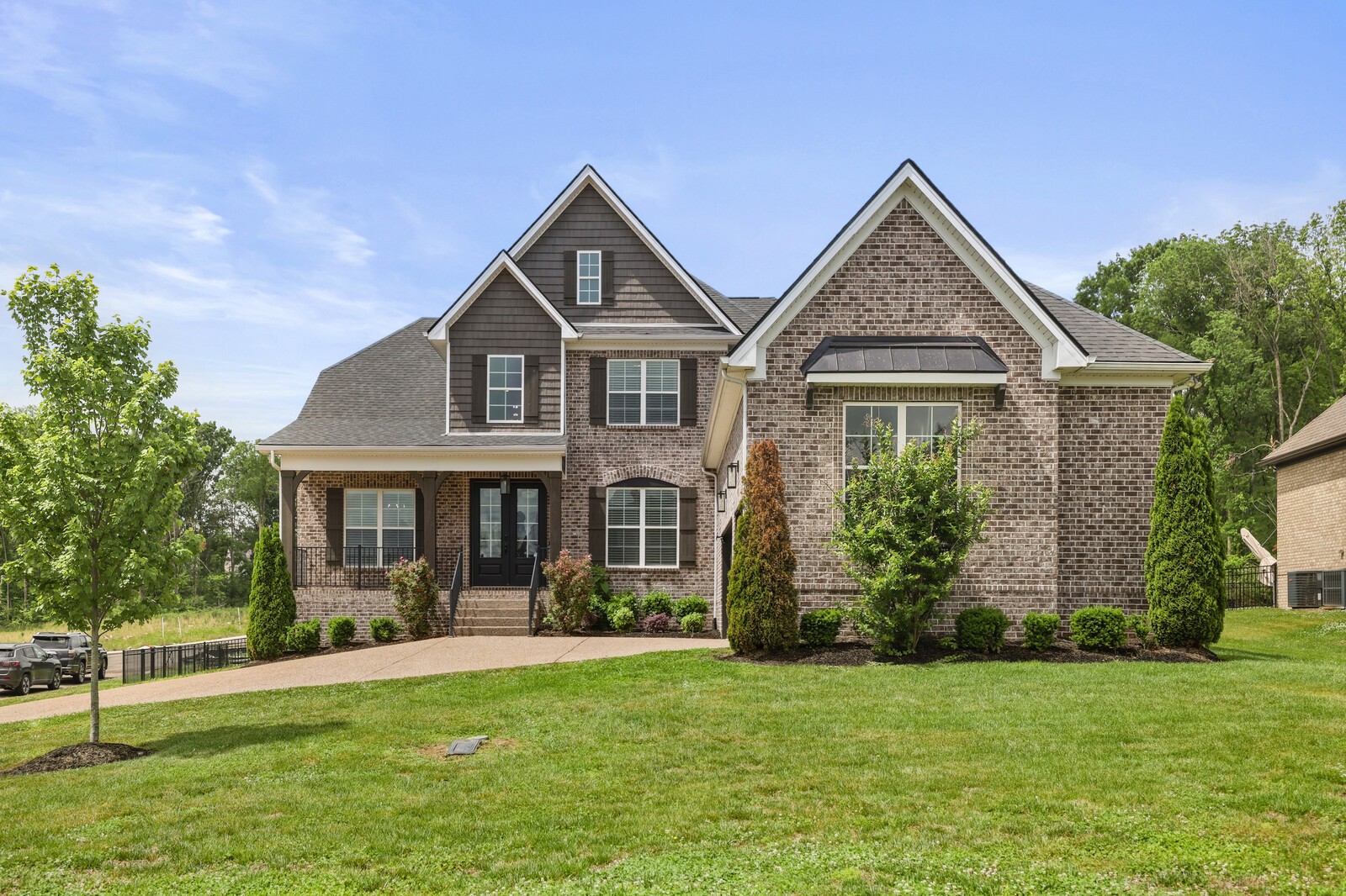 400 Millstone Place Lebanon, TN 37087 - Photo 1 of 58 a front view of a house with garden