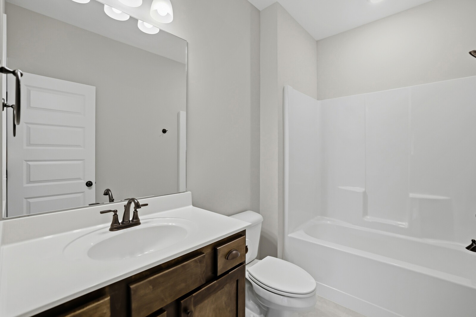 400 Millstone Place Lebanon, TN 37087 - Photo 23 of 58 a bathroom with a sink a toilet and a bathtub