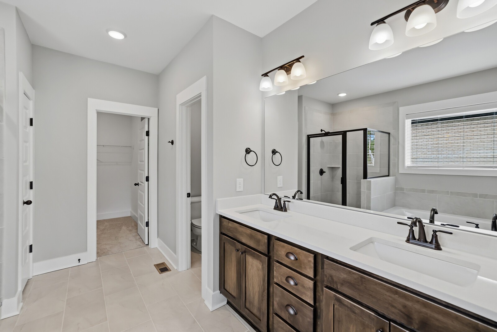 400 Millstone Place Lebanon, TN 37087 - Photo 28 of 58 a spacious bathroom with a double vanity sink mirror and double