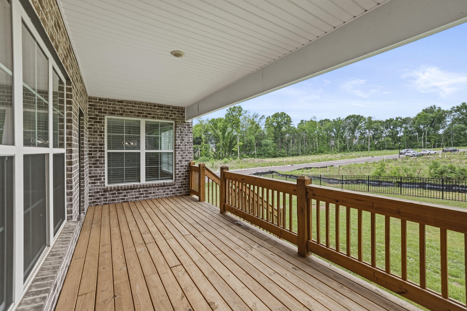 400 Millstone Place Lebanon, TN 37087 - Photo 43 of 58 a view of a balcony with wooden floor and outdoor space