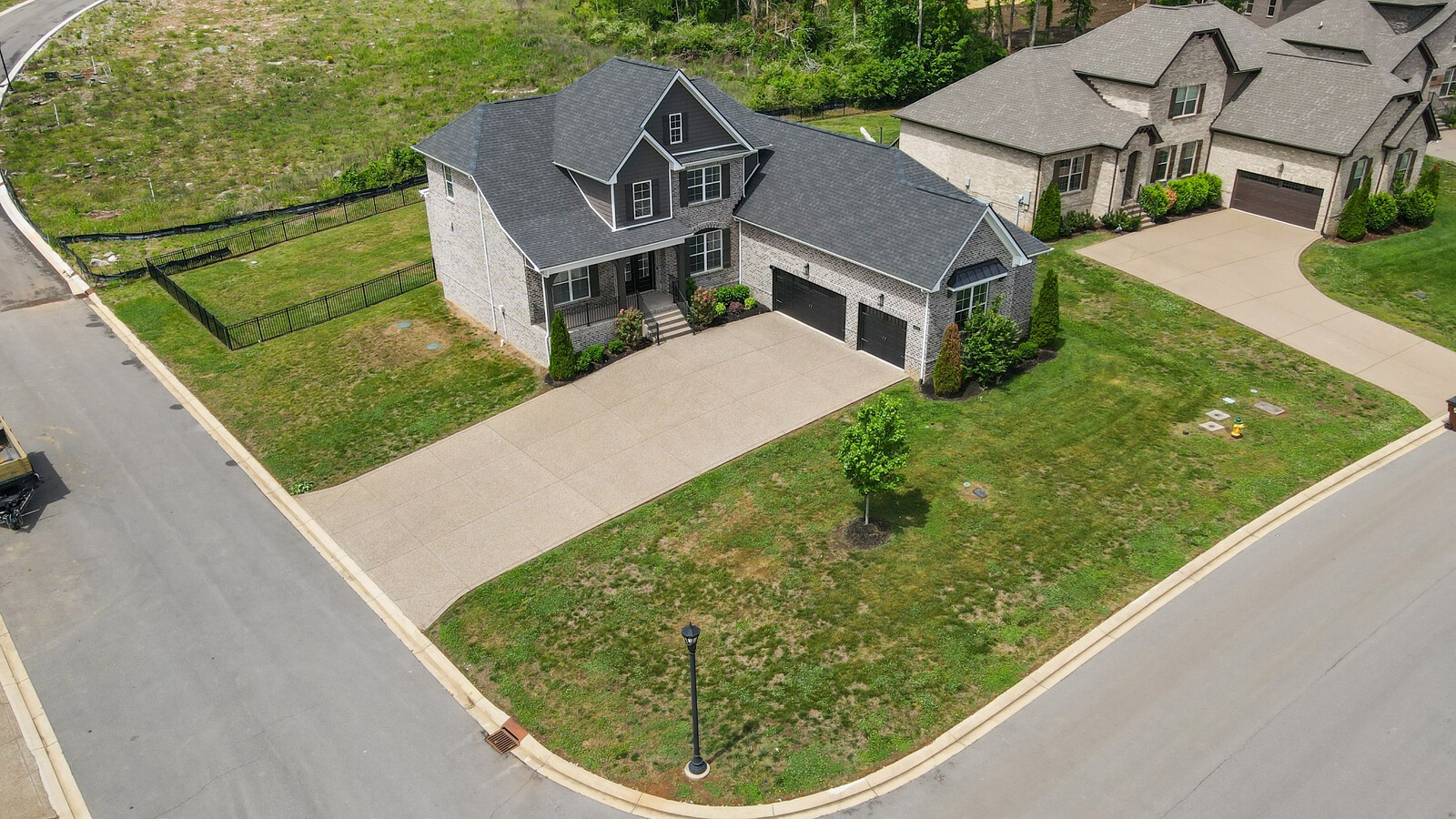 400 Millstone Place Lebanon, TN 37087 - Photo 50 of 58 a view of a white house with a small yard and a large pool
