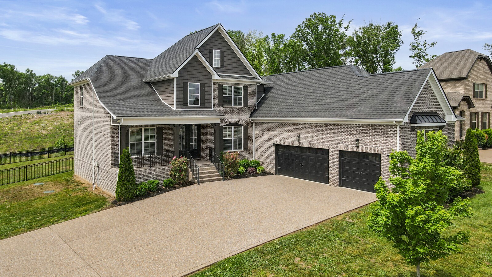 400 Millstone Place Lebanon, TN 37087 - Photo 51 of 58 a front view of a house with a yard and garage