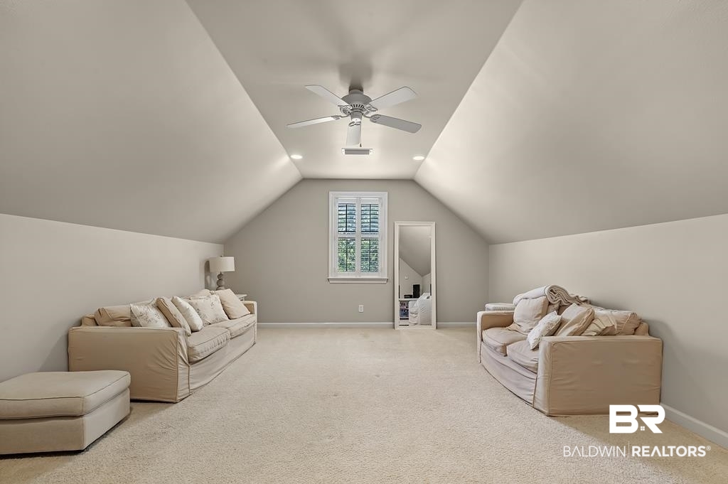 30014 Dolive Ridge Daphne, AL 36527 - Photo 46 of 57 Interior space featuring ceiling fan, vaulted ceiling, and light carpet
