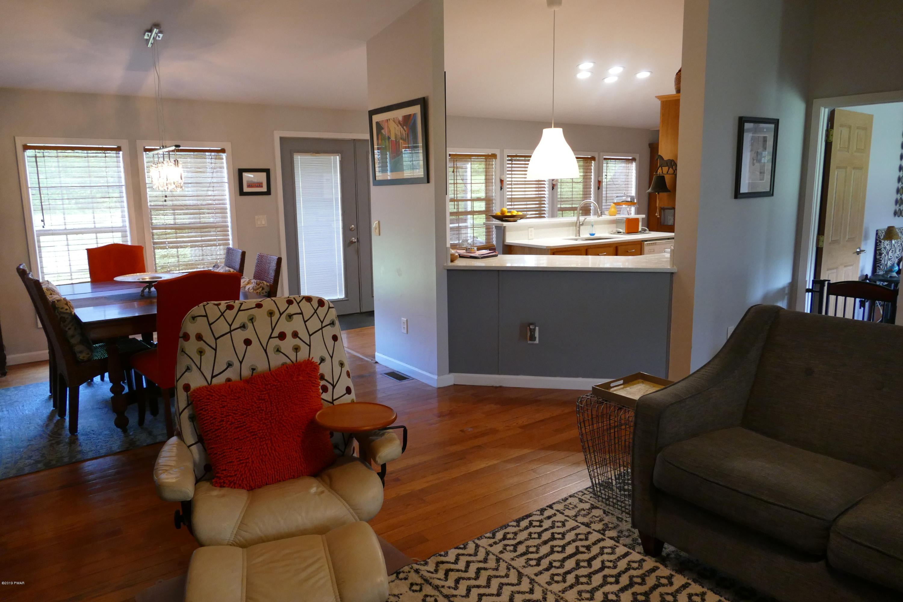 108 Savitz Road Moscow, PA 18444 - Photo 21 of 46 a living room with furniture and a wooden floor