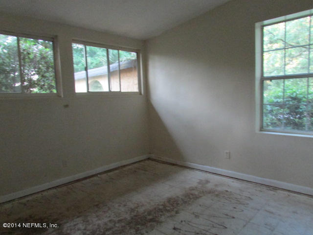 3018 Kline Road Jacksonville, FL 32246 - Photo 14 of 23 an empty room with a window