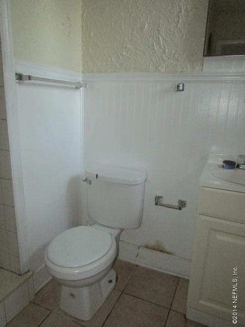 3018 Kline Road Jacksonville, FL 32246 - Photo 16 of 23 a white toilet sitting next to a shower