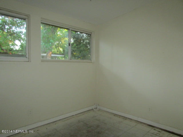 3018 Kline Road Jacksonville, FL 32246 - Photo 18 of 23 an empty room with a window