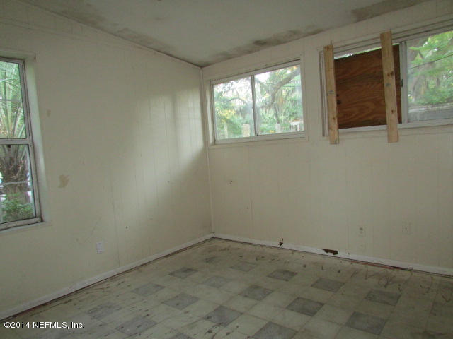 3018 Kline Road Jacksonville, FL 32246 - Photo 20 of 23 an empty room with a window