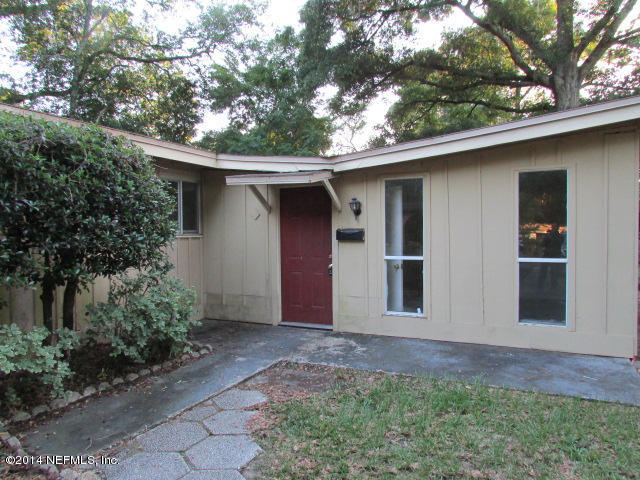 3018 Kline Road Jacksonville, FL 32246 - Photo 2 of 23 a house with trees in the background