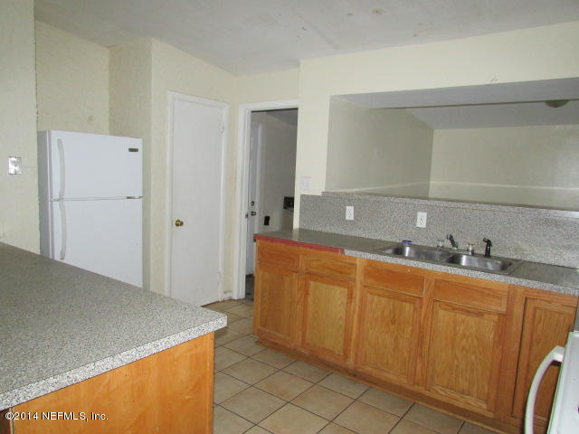 3018 Kline Road Jacksonville, FL 32246 - Photo 6 of 23 a spacious bathroom with a sink and mirror