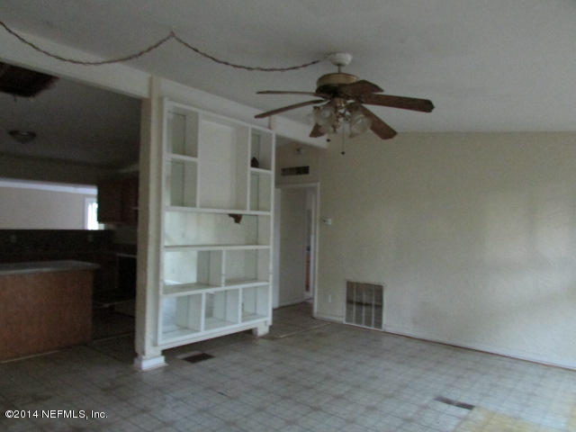 3018 Kline Road Jacksonville, FL 32246 - Photo 10 of 23 a view of a store room with a cabinet