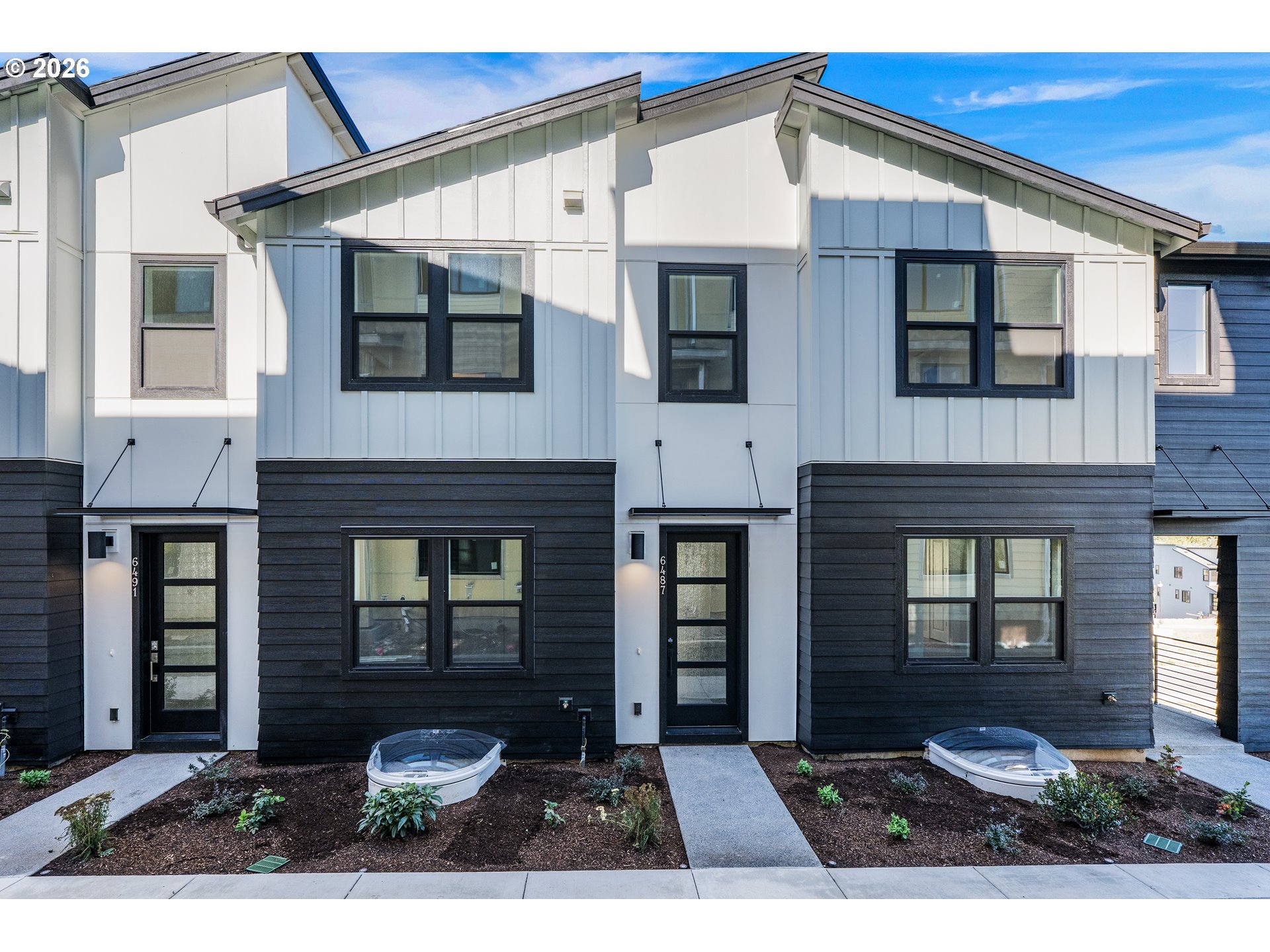 6487 Northwest Olympic Lane, Unit 27 Camas, WA 98607 - Photo 1 of 24 a front view of a house