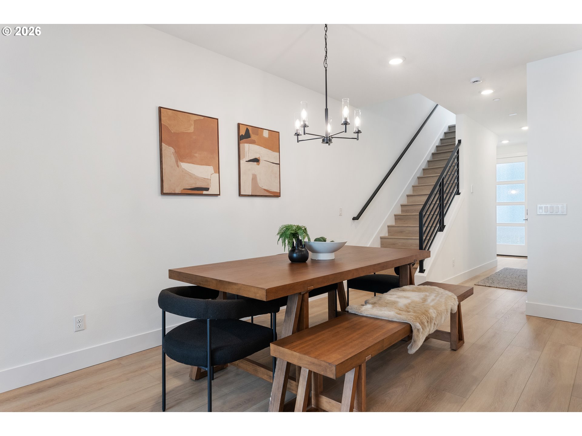 6487 Northwest Olympic Lane, Unit 27 Camas, WA 98607 - Photo 11 of 24 a view of a room with furniture and wooden floor