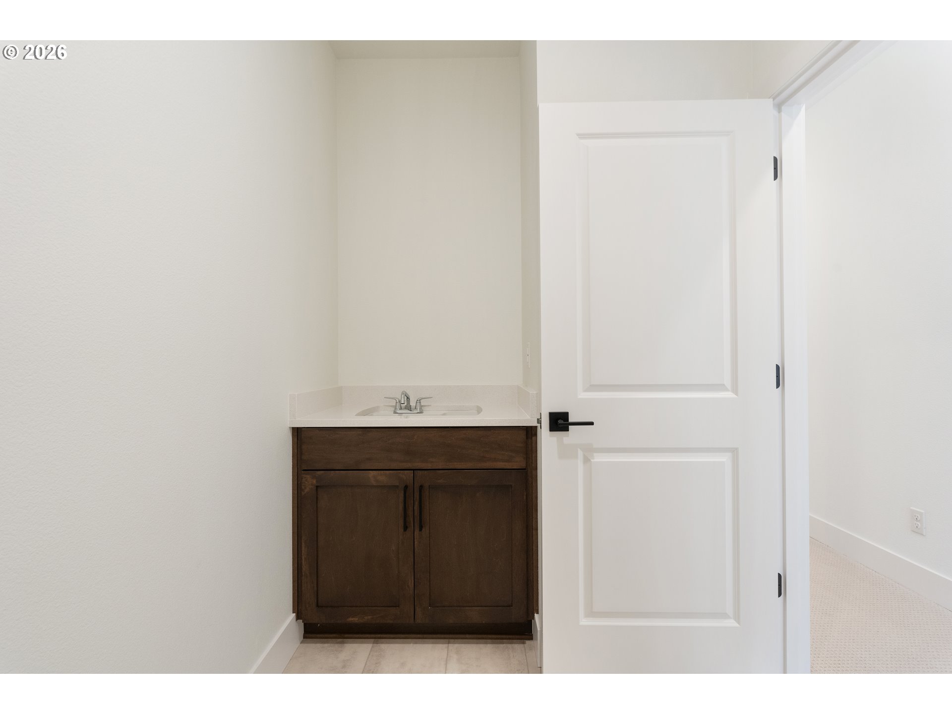 6487 Northwest Olympic Lane, Unit 27 Camas, WA 98607 - Photo 18 of 24 a bathroom with a sink and vanity