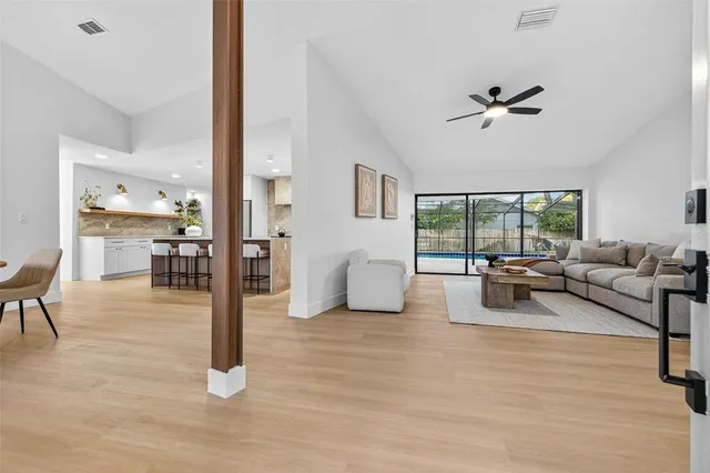 a living room with furniture and a table