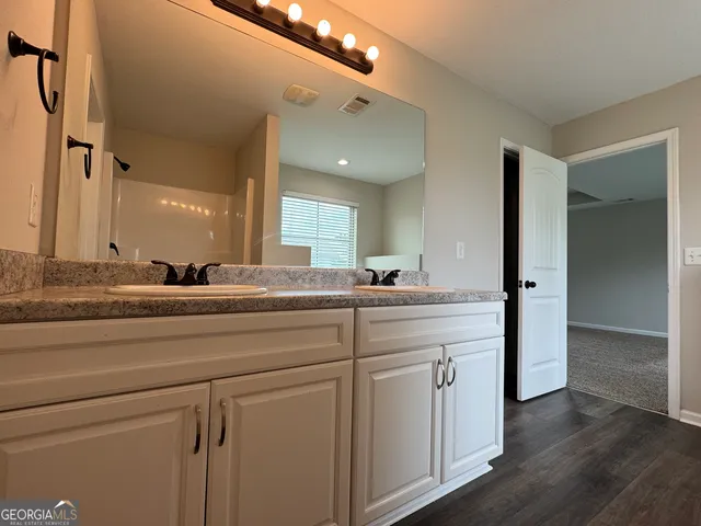 a view of an empty walk in closet