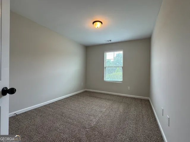 a bathroom with a white bath tub