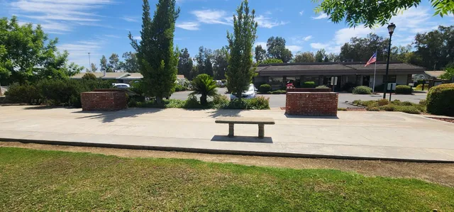 a view of a swimming pool with a patio