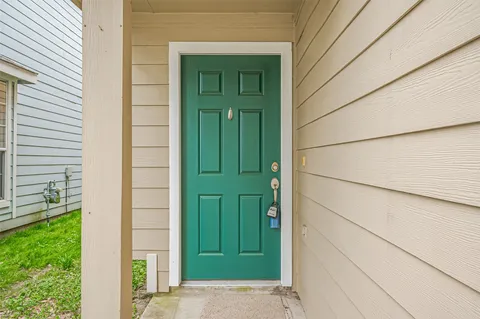 a view of a kitchen with a sink and a kitchen