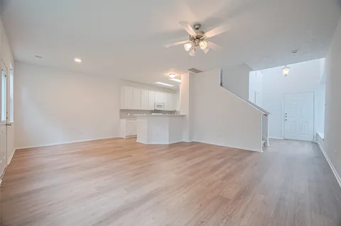 a view of a room with a large window