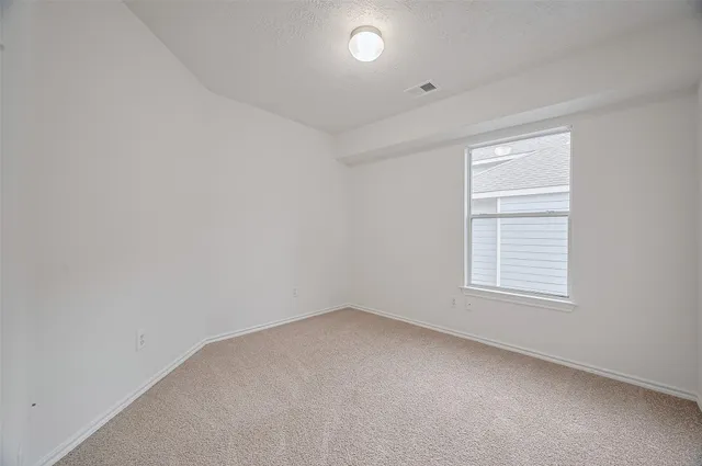 a bathroom with a sink toilet vanity and a mirror