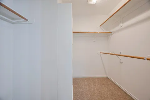 a bathroom with 2 sink and a mirror