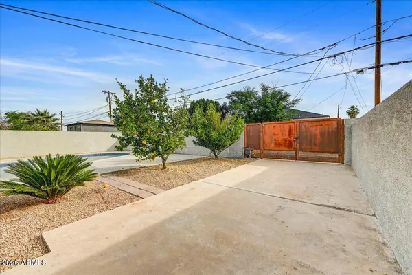 a view of a house with a street