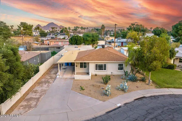 an aerial view of a house with a garden