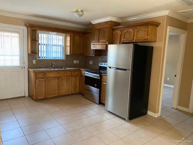 1404 East Quail Street Pharr, TX 78577 - Photo 4 of 12 a kitchen with stainless steel appliances granite countertop a refrigerator and a sink