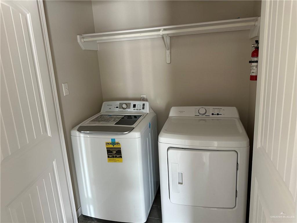 1404 East Quail Street Pharr, TX 78577 - Photo 8 of 12 a utility room with dryer and washer