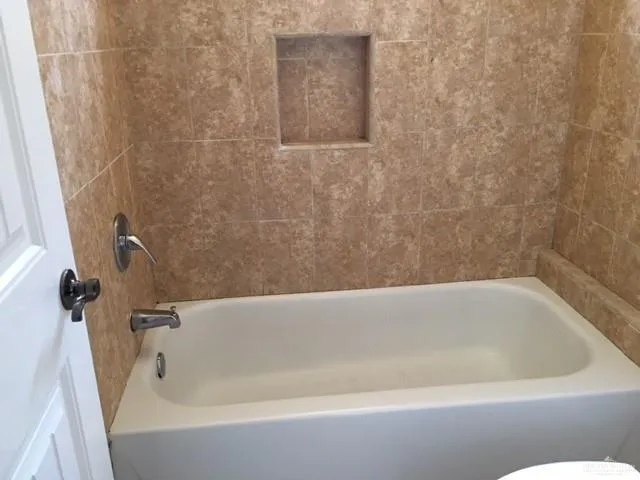 a bathroom with a bathtub