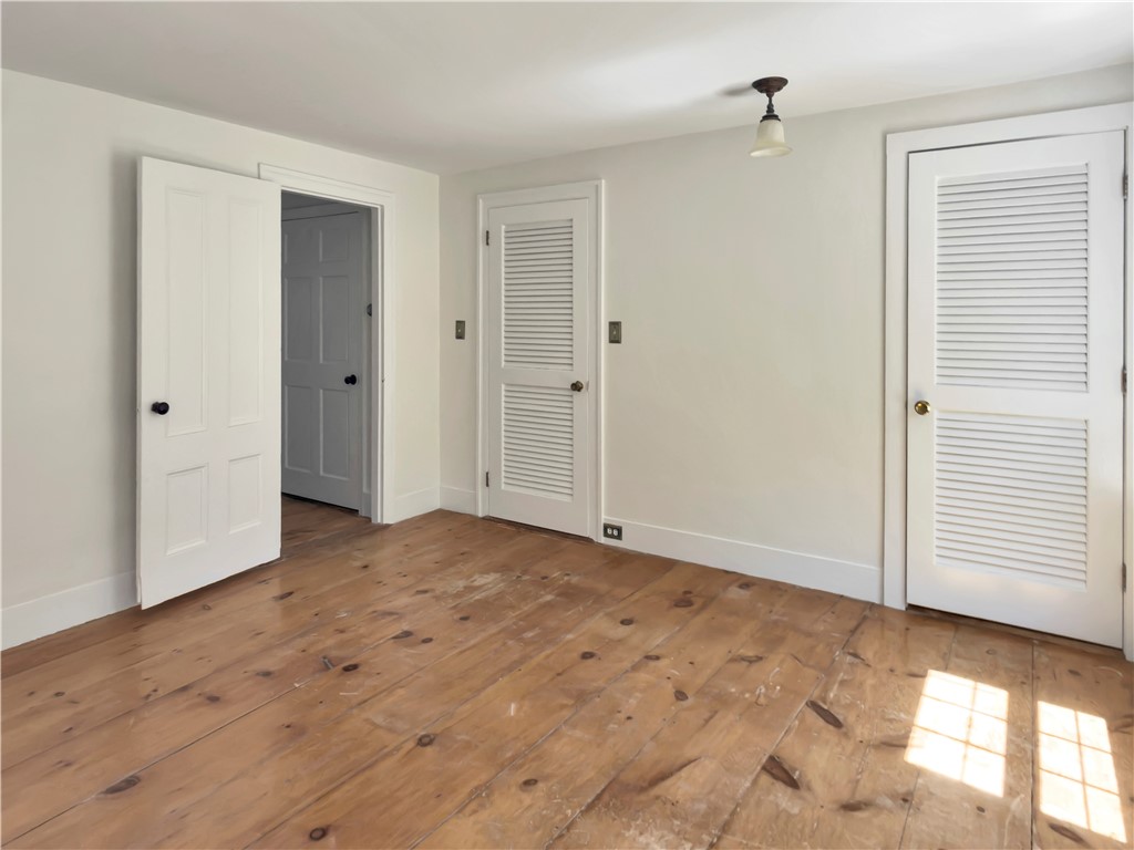 33 Indian Pond Road Kingston, MA 02364 - Photo 29 of 44 Primary Bedroom with long connected walk in closet