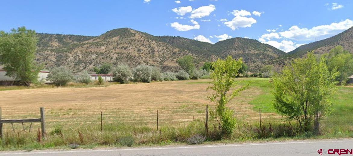 756 Airport Road Rifle, CO 81650 - Photo 1 of 3 a view of a yard with an outdoor space