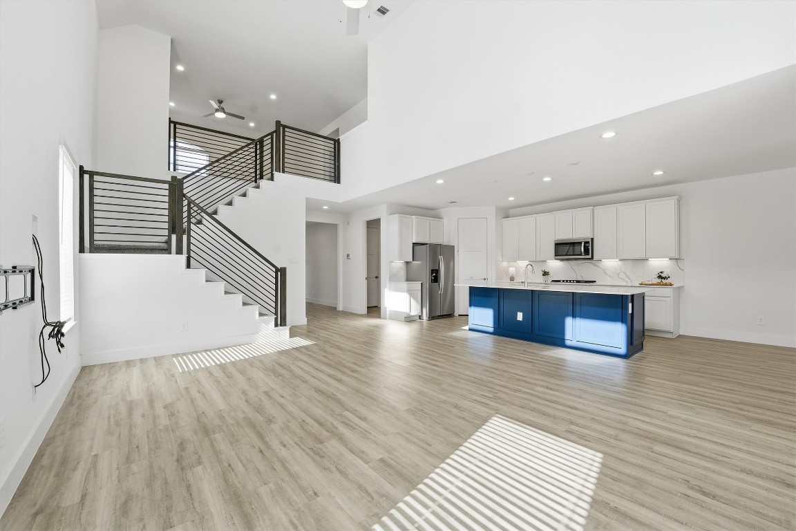 13744 Rising Sun Lane Conroe, TX 77384 - Photo 11 of 41 view of the kitchen and staiway