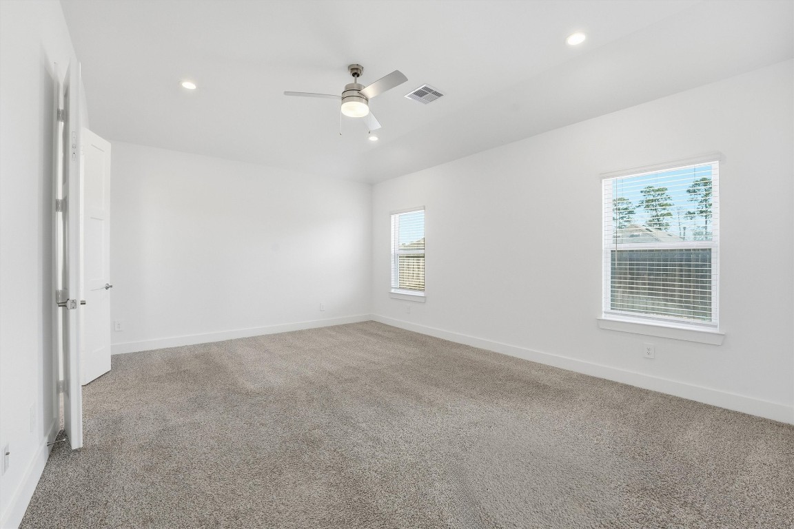 13744 Rising Sun Lane Conroe, TX 77384 - Photo 18 of 41 Primary bedroom