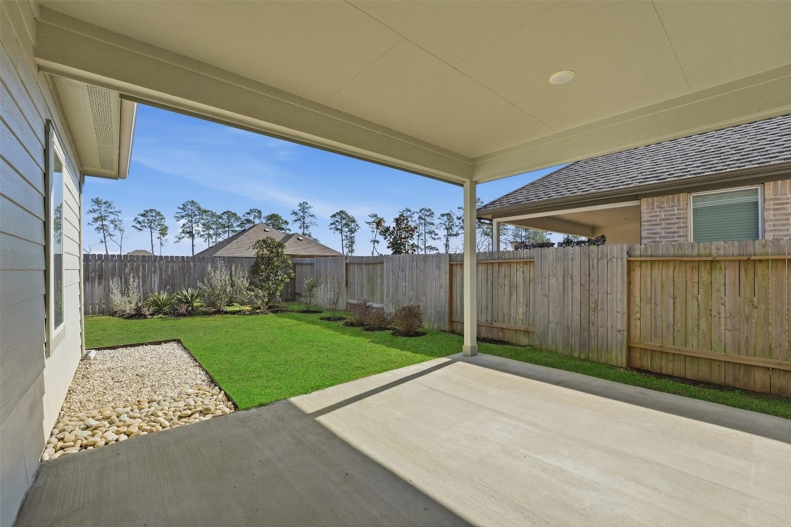 13744 Rising Sun Lane Conroe, TX 77384 - Photo 32 of 41 Private covered back porch