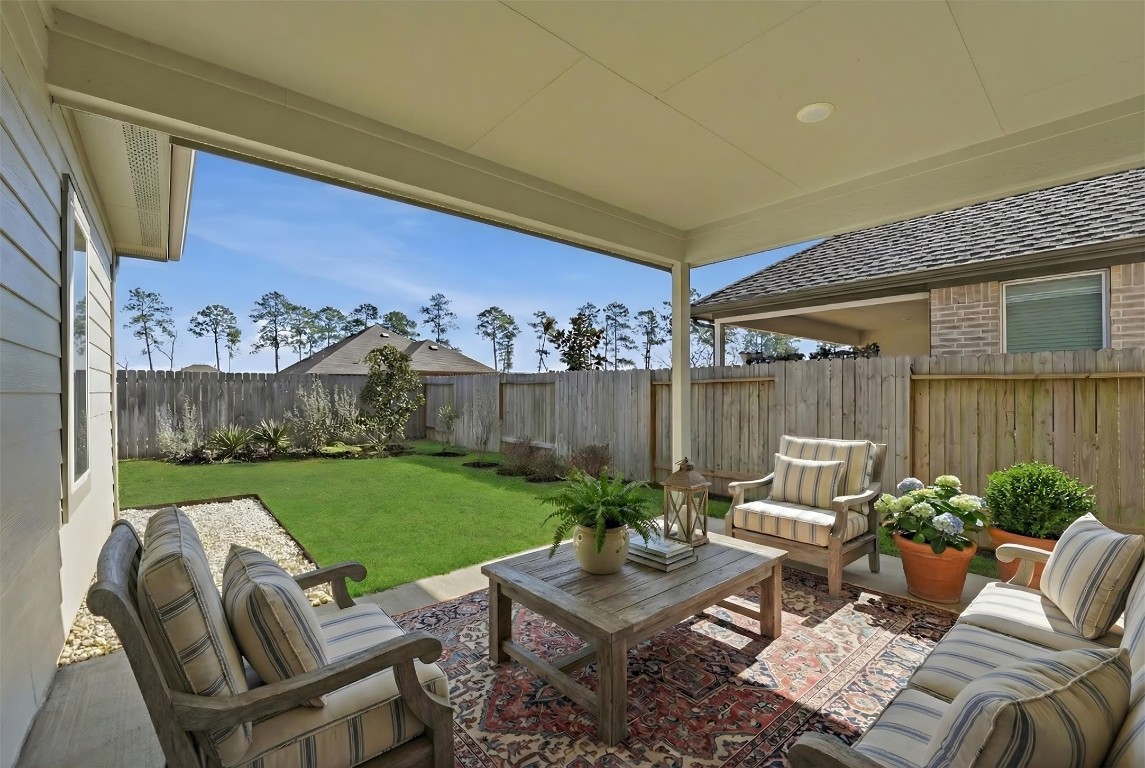 13744 Rising Sun Lane Conroe, TX 77384 - Photo 33 of 41 Virtually staged back porch