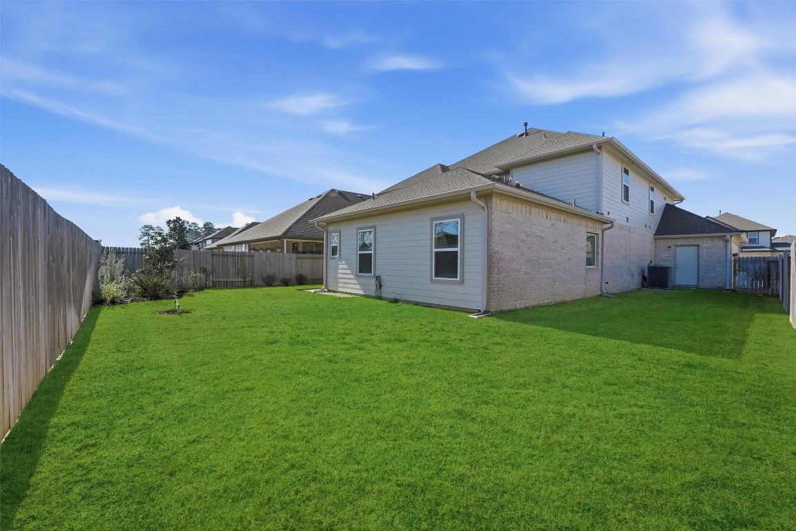 13744 Rising Sun Lane Conroe, TX 77384 - Photo 34 of 41 view of the backyard