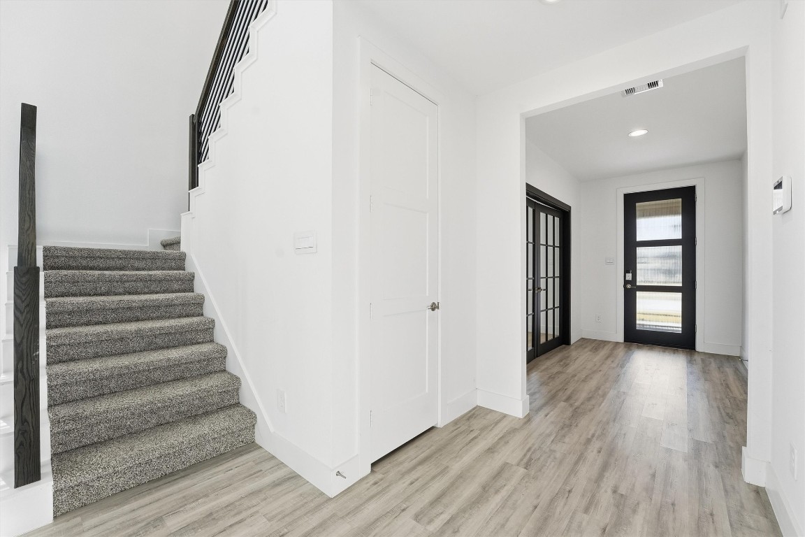 13744 Rising Sun Lane Conroe, TX 77384 - Photo 8 of 41 view of the hallway towards entry door