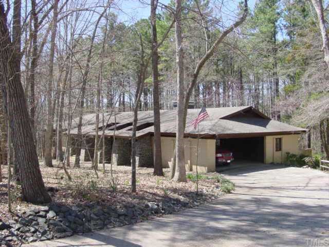 417 Clayton Road Durham, NC 27703 - Photo 1 of 1 a front view of a house with a garden