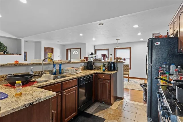 a kitchen with lots of counter top space and appliances