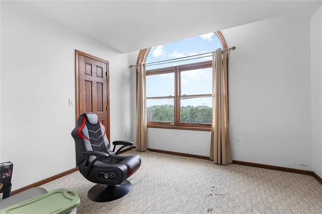 a room with furniture and a window