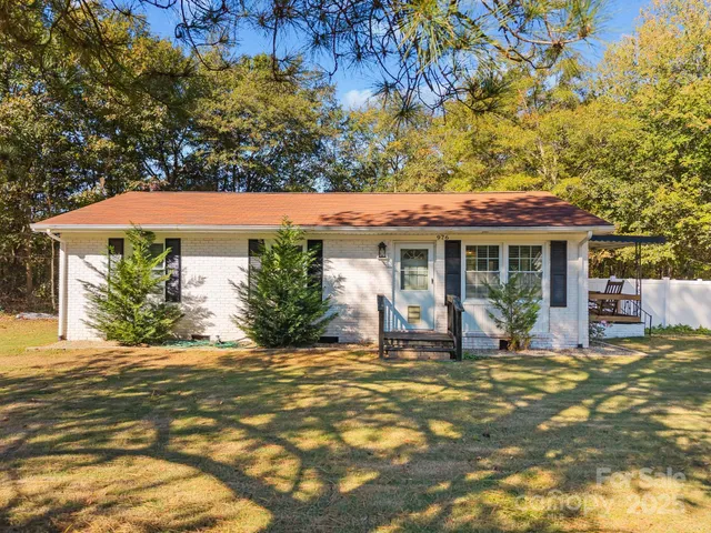 a house view with a garden space