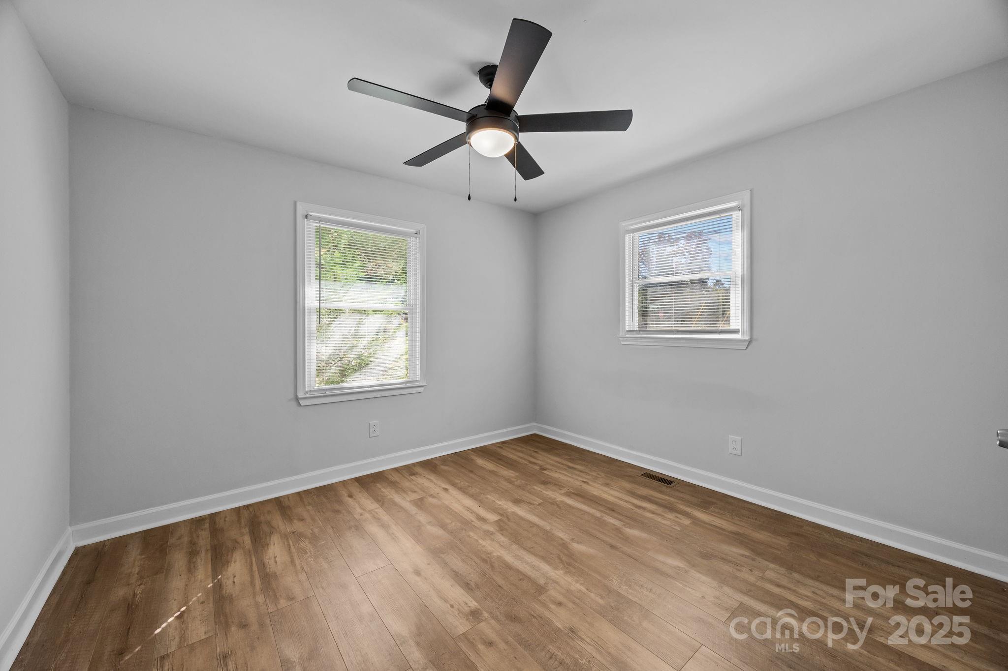 976 10 Oaks Drive Lancaster, SC 29720 - Photo 14 of 24 a view of empty room with wooden floor