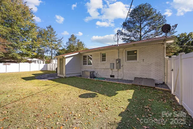 a view of a house with snow on the background